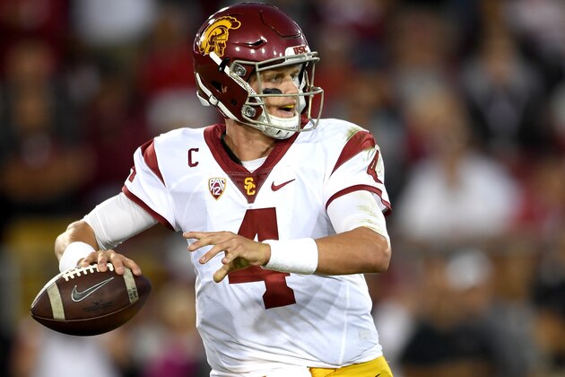 PALO ALTO, CA - SEPTEMBER 17:  Max Browne #4 of the USC Trojans rolls out and looks to throw a pass against the Stanford Cardinal during the second half of their NCAA football game at Stanford Stadium on September 17, 2016 in Palo Alto, California.  (Photo by Thearon W. Henderson/Getty Images)