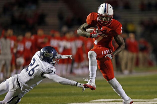 New Mexico running back Teriyon Gipson (7) avoids the attempted tackle by Nevada defensive back Kendall Johnson (26) during the first half of an NCAA college football game in Albuquerque, N.M., Saturday, Nov. 5, 2016. (AP Photo/Andres Leighton)