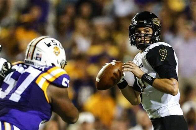 Southern Mississippi quarterback Nick Mullens (9) drops back to pass against LSU during the first half of an NCAA college football game, Saturday, Oct. 15, 2016, in Baton Rouge, La. (AP Photo/Butch Dill)