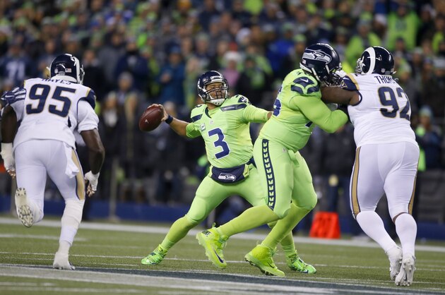 SEATTLE, WA - DECEMBER 15:  Quarterback Russell Wilson #3 of the Seattle Seahawks passes against the Los Angeles Rams at CenturyLink Field on December 15, 2016 in Seattle, Washington.  (Photo by Otto Greule Jr/Getty Images)