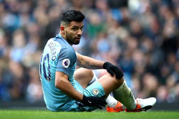 MANCHESTER, ENGLAND - DECEMBER 03:  Sergio Aguero of Manchester City lies injured during the Premier League match between Manchester City and Chelsea at Etihad Stadium on December 3, 2016 in Manchester, England.  (Photo by Clive Brunskill/Getty Images)
