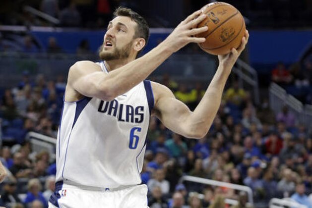 Dallas Mavericks' Andrew Bogut (6) looks for a shot against the Orlando Magic during the first half of an NBA basketball game, Saturday, Nov. 19, 2016, in Orlando, Fla. (AP Photo/John Raoux)