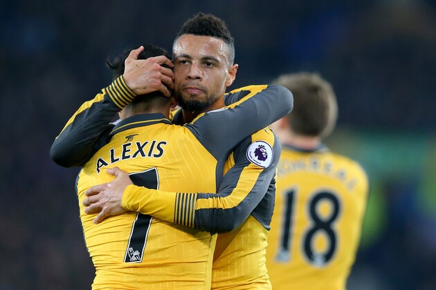 LIVERPOOL, ENGLAND - DECEMBER 13:  Alexis Sanchez (L) of Arsenal celebrates with teammate Francis Coquelin after scoring the opening goal during the Premier League match between Everton and Arsenal at Goodison Park on December 13, 2016 in Liverpool, England.  (Photo by Alex Livesey/Getty Images)
