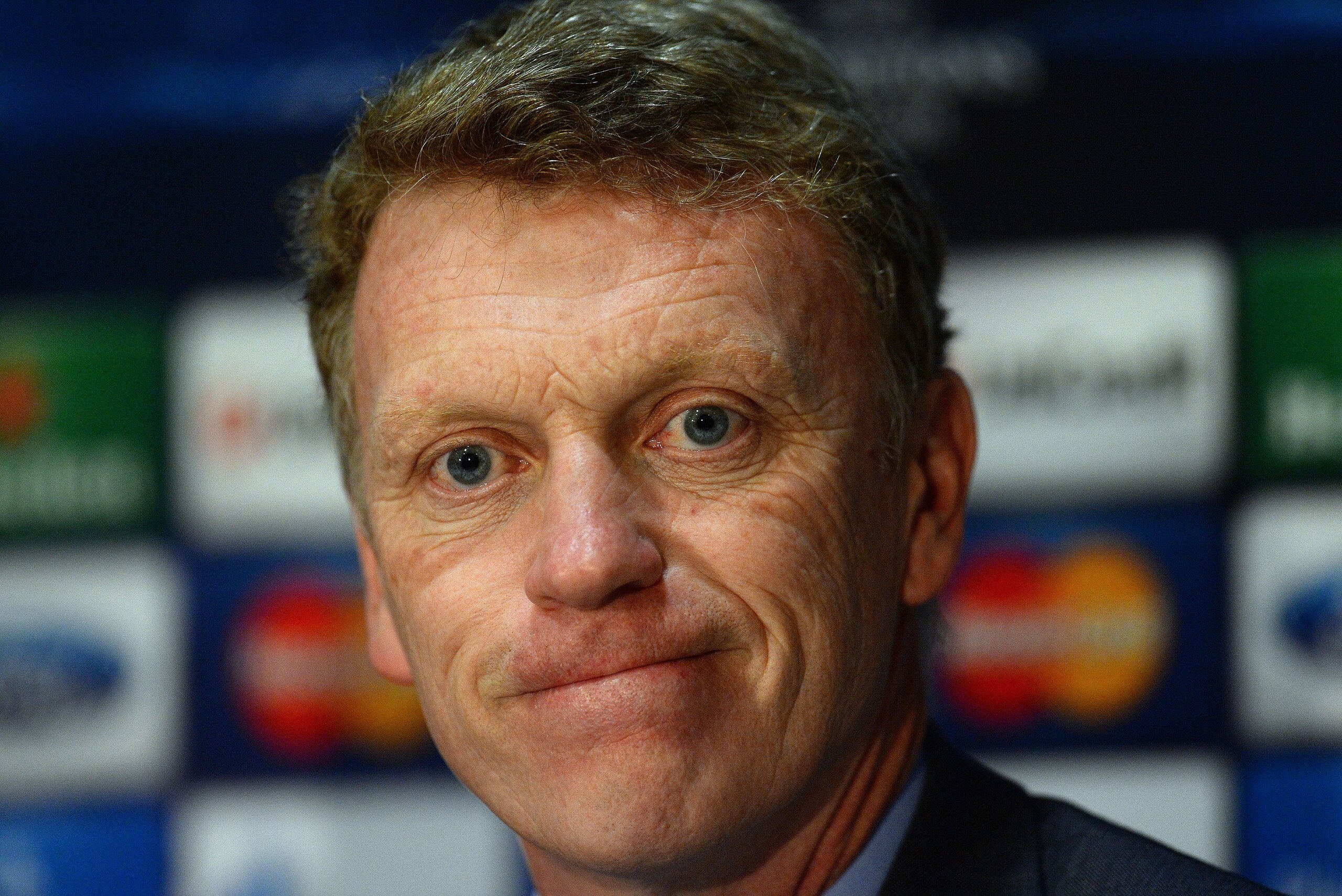 Manchester United's Scottish manager David Moyes attends a press conference at Old Trafford in Manchester, north-west England on March 31, 2014 on the eve of their UEFA Champions League quarter-final first leg football match against Bayern Munich at Old Trafford. AFP PHOTO / ANDREW YATES        (Photo credit should read ANDREW YATES/AFP/Getty Images)