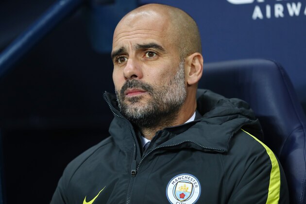 MANCHESTER, ENGLAND - DECEMBER 14: Josep Guardiola, Manager of Manchester City looks on during the Premier League match between Manchester City and Watford at Etihad Stadium on December 14, 2016 in Manchester, England.  (Photo by Michael Steele/Getty Images)
