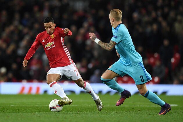 MANCHESTER, ENGLAND - NOVEMBER 24: Memphis Depay of Manchester United is watched by Rick Karsdorp of Feyenoord during the UEFA Europa League Group A match between Manchester United FC and Feyenoord at Old Trafford on November 24, 2016 in Manchester, England. (Photo by Gareth Copley/Getty Images) MANCHESTER, ENGLAND - NOVEMBER 24: Memphis Depay of Manchester United is watched by Rick Karsdorp of Feyenoord during the UEFA Europa League Group A match between Manchester United FC and Feyenoord at Old Trafford on November 24, 2016 in Manchester, England. (Photo by Gareth Copley/Getty Images)