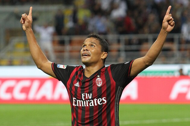 MILAN, ITALY - SEPTEMBER 20:  Carlos Bacca of AC Milan celebrates after scoring the opening goal during the Serie A match between AC Milan and SS Lazio at Stadio Giuseppe Meazza on September 20, 2016 in Milan, Italy.  (Photo by Marco Luzzani/Getty Images)