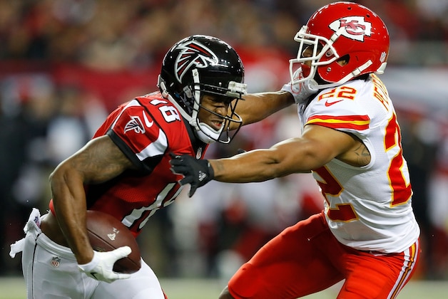 ATLANTA, GA - DECEMBER 04:  Taylor Gabriel #18 of the Atlanta Falcons stiff arms Marcus Peters #22 of the Kansas City Chiefs at Georgia Dome on December 4, 2016 in Atlanta, Georgia.  (Photo by Kevin C. Cox/Getty Images)