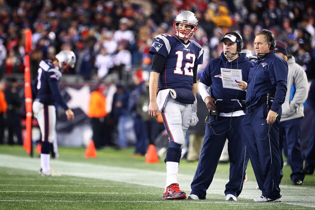 FOXBORO, MA - DECEMBER 12:  Head Coach Bill Belichick, offensive Coordinator Josh McDaniels and Tom Brady #12 of the New England Patriots look on during a time out in the first half against the Baltimore Ravens at Gillette Stadium on December 12, 2016 in Foxboro, Massachusetts.  (Photo by Adam Glanzman/Getty Images)