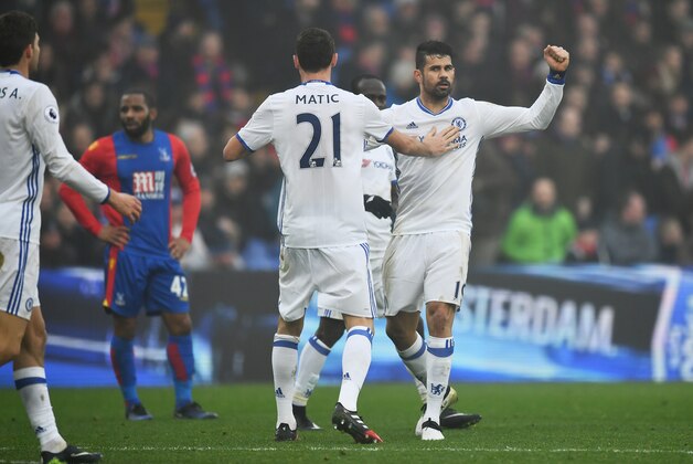 LONDON, ENGLAND - DECEMBER 17: Diego Costa of Chelsea (R) celebrates scoring his sides first goal with Nemanja Matic of Chelsea (L) during the Premier League match between Crystal Palace and Chelsea at Selhurst Park on December 17, 2016 in London, England.  (Photo by Dan Mullan/Getty Images)