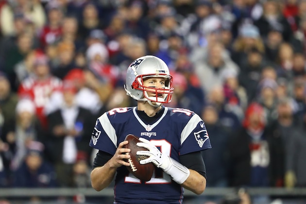 FOXBORO, MA - DECEMBER 12:  Tom Brady #12 of the New England Patriots looks to throws during the first half against the Baltimore Ravens at Gillette Stadium on December 12, 2016 in Foxboro, Massachusetts.  (Photo by Adam Glanzman/Getty Images)