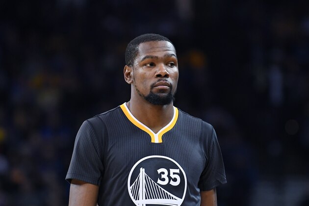OAKLAND, CA - DECEMBER 03:  Kevin Durant #35 of the Golden State Warriors looks on against the Phoenix Suns during an NBA basketball game at ORACLE Arena on December 3, 2016 in Oakland, California. NOTE TO USER: User expressly acknowledges and agrees that, by downloading and or using this photograph, User is consenting to the terms and conditions of the Getty Images License Agreement.  (Photo by Thearon W. Henderson/Getty Images)