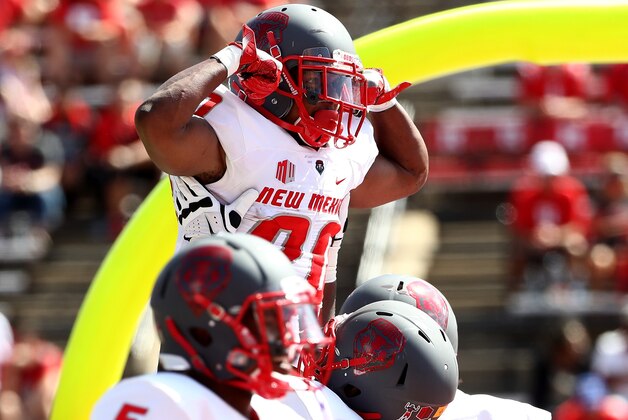 PISCATAWAY, NJ - SEPTEMBER 17:  Daryl Chestnut #20 of the New Mexico Lobos celebrates his touchdown in the first half against the Rutgers Scarlet Knights at High Point Solutions Stadium on September 17, 2016 in Piscataway, New Jersey.  (Photo by Elsa/Getty Images)