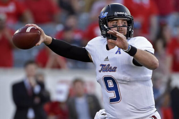 Tulsa quarterback Dane Evans throws a pass in the first half of an NCAA college football game against Houston, Saturday, Oct. 15, 2016, in Houston. (AP Photo/Eric Christian Smith)
