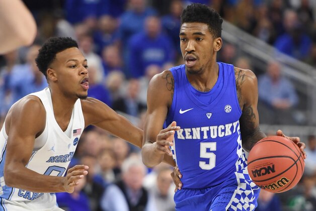 LAS VEGAS, NV - DECEMBER 17:  Malik Monk #5 of the Kentucky Wildcats drives against Nate Britt #0 of the North Carolina Tar Heels during the CBS Sports Classic at T-Mobile Arena on December 17, 2016 in Las Vegas, Nevada. Kentucky won 103-100.  (Photo by Ethan Miller/Getty Images)