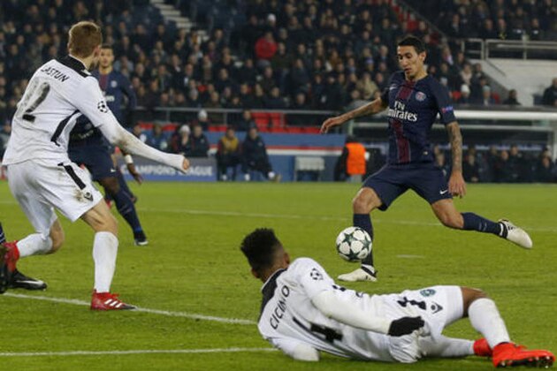 PSG's Angel Di Maria, right, scores his team's second goal during the Champions League Group A soccer match between Paris Saint Germain and Ludogorets at the Parc des Princes stadium in Paris, Tuesday, Dec. 6, 2016. (AP Photo/Michel Euler)
