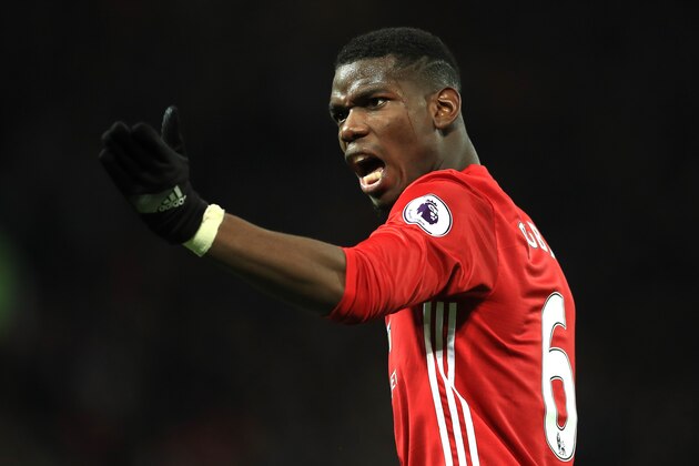 MANCHESTER, ENGLAND - DECEMBER 11:  Paul Pogba of Manchester United gestures  during the Premier League match between Manchester United and Tottenham Hotspur at Old Trafford on December 11, 2016 in Manchester, England.  (Photo by Richard Heathcote/Getty Images)