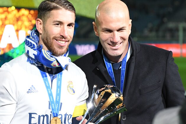 YOKOHAMA, JAPAN - DECEMBER 18:  Sergio Ramos and Zinedine Zidane of Real Madrid look on after the FIFA Club World Cup final match between Real Madrid and Kashima Antlers at International Stadium Yokohama on December 18, 2016 in Yokohama, Japan.  (Photo by Masashi Hara/Getty Images)