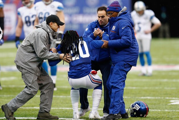 EAST RUTHERFORD, NJ - DECEMBER 18:  Janoris Jenkins #20 of the New York Giants gets after colliding with a Detroit Lions player in the first half at MetLife Stadium on December 18, 2016 in East Rutherford, New Jersey.  (Photo by Jeff Zelevansky/Getty Images)