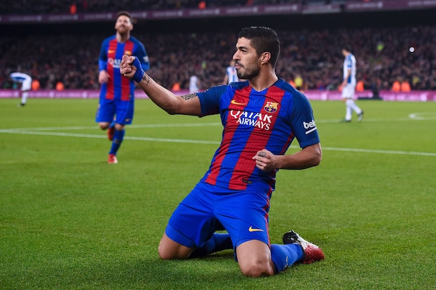 Barcelona's Uruguayan forward Luis Suarez celebrates a goal during the Spanish league football match FC Barcelona vs RCD Espanyol at the Camp Nou stadium in Barcelona on December 18, 2016. / AFP / JOSEP LAGO        (Photo credit should read JOSEP LAGO/AFP/Getty Images)