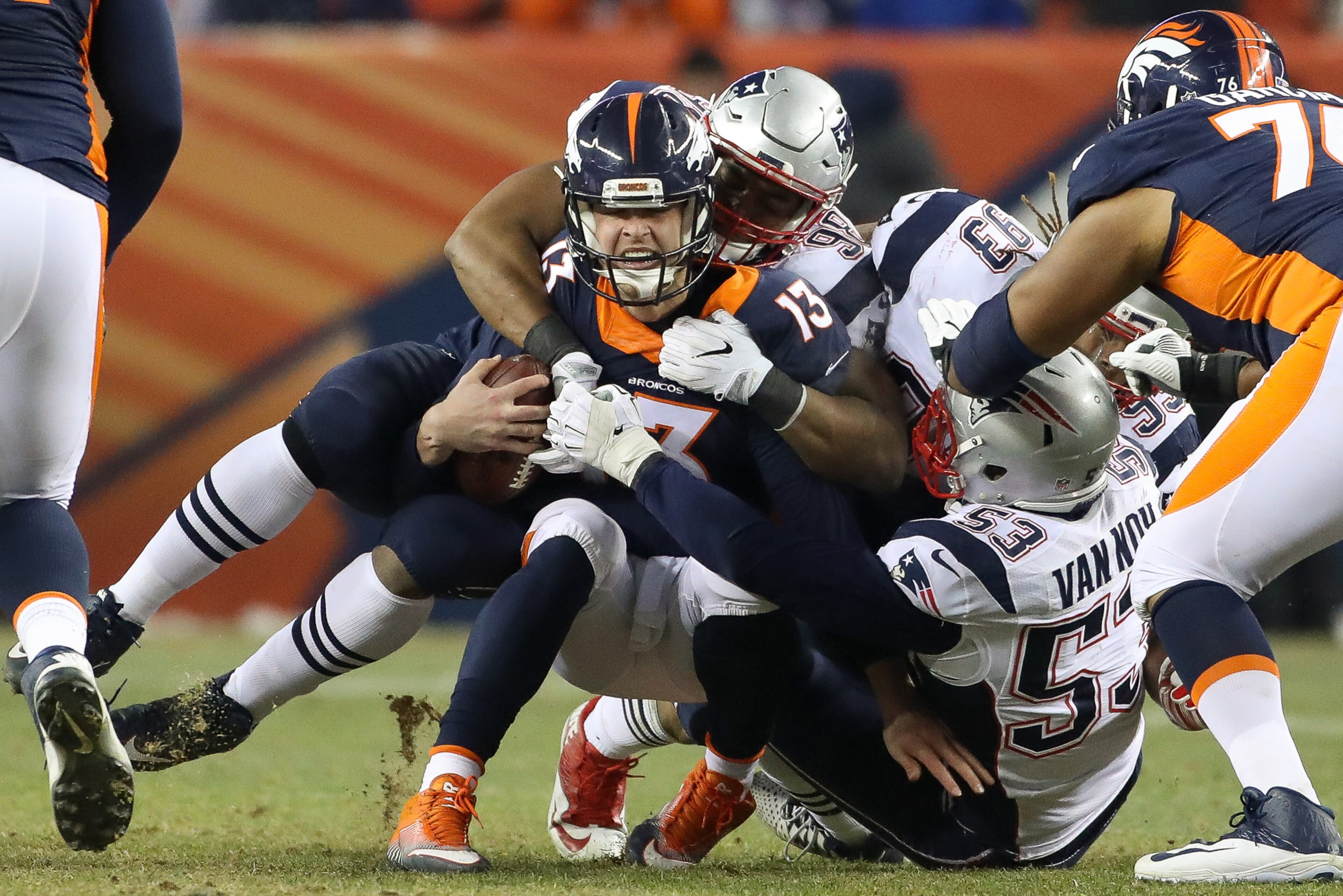 DENVER, CO - DECEMBER 18: Quarterback Trevor Siemian #13 of the Denver Broncos is sacked by defensive end Trey Flowers #98 of the New England Patriots in the fourth quarter at Sports Authority Field at Mile High on December 18, 2016 in Denver, Colorado. (Photo by Matthew Stockman/Getty Images) DENVER, CO - DECEMBER 18: Quarterback Trevor Siemian #13 of the Denver Broncos is sacked by defensive end Trey Flowers #98 of the New England Patriots in the fourth quarter at Sports Authority Field at Mile High on December 18, 2016 in Denver, Colorado. (Photo by Matthew Stockman/Getty Images)