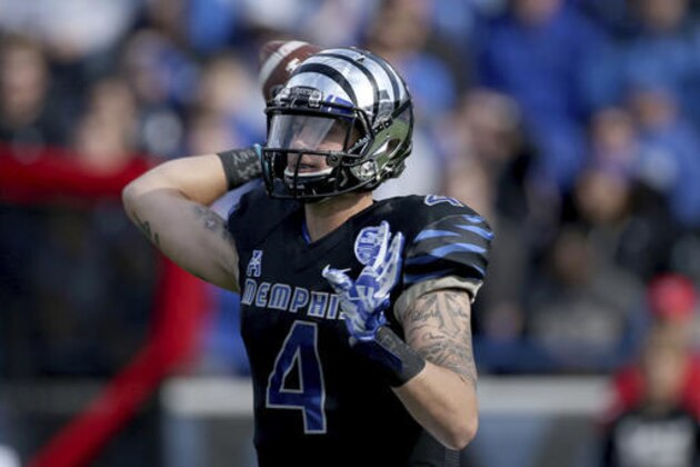 Memphis quarterback Riley Ferguson throws a pass in the first half of an NCAA college football game Friday, Nov. 25, 2016, in Memphis, Tenn. (AP Photo/Nikki Boertman) Memphis quarterback Riley Ferguson throws a pass in the first half of an NCAA college football game Friday, Nov. 25, 2016, in Memphis, Tenn. (AP Photo/Nikki Boertman)