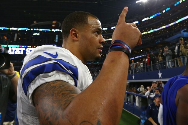 ARLINGTON, TX - DECEMBER 18:  Dak Prescott #4 of the Dallas Cowboys leaves the field after defeating the Tampa Bay Buccaneers at AT&T Stadium on December 18, 2016 in Arlington, Texas. (Photo by Ronald Martinez/Getty Images)
