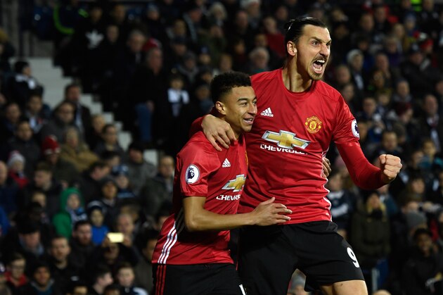 WEST BROMWICH, ENGLAND - DECEMBER 17:  Zlatan Ibrahimovic of Manchester United (R) celebrates scoring his sides first goal with Jesse Lingard of Manchester United (L) during the Premier League match between West Bromwich Albion and Manchester United at The Hawthorns on December 17, 2016 in West Bromwich, England. (Photo by Stu Forster/Getty Images)