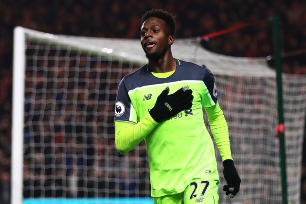 MIDDLESBROUGH, ENGLAND - DECEMBER 14: Divock Origi of Liverpool celebrates scoring his side's second goal during the Barclays Premier League match between Middlesbrough and Liverpool at the Riverside Stadium on December 14, 2016 in Middlesbrough, England. (Photo by Chris Brunskill - AMA/Getty Images)
