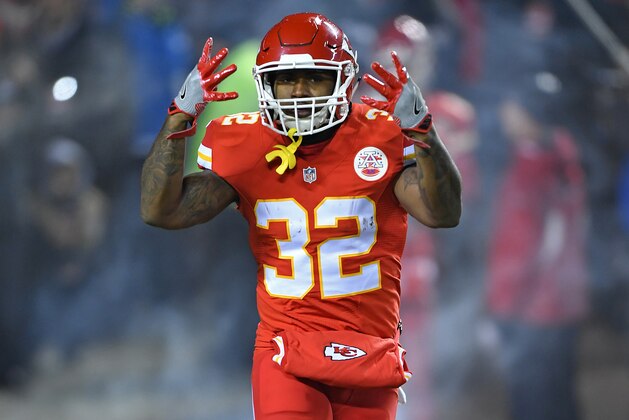 KANSAS CITY, MO - DECEMBER 08:  Running back Spencer Ware #32 of the Kansas City Chiefs reacts, as he is introduced prior to a game against the Oakland Raiders on December 8, 2016 at Arrowhead Stadium in Kansas City, Missouri.  (Photo by Peter G. Aiken/Getty Images)