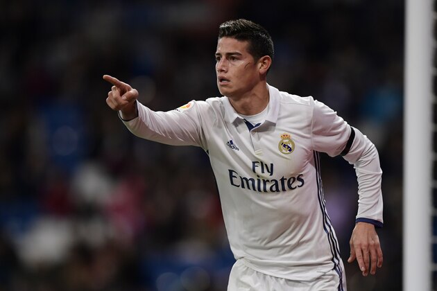 Real Madrid's Colombian midfielder James Rodriguez celebrates after scoring during the Spanish Copa del Rey (King's Cup) Round of 32 second leg football match Real Madrid CF vs Cultural y Deportiva Leonesa at the Santiago Bernabeu stadium in Madrid on November 30, 2016. / AFP / JAVIER SORIANO        (Photo credit should read JAVIER SORIANO/AFP/Getty Images)