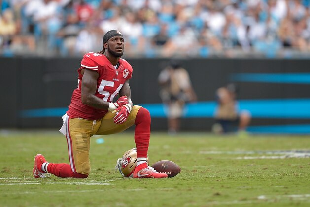 CHARLOTTE, NC - SEPTEMBER 18:  Ray-Ray Armstrong #54 of the San Francisco 49ers watches the scoreboard as he waits for officials to review a play during the game against the Carolina Panthers at Bank of America Stadium on September 18, 2016 in Charlotte, North Carolina.  (Photo by Grant Halverson/Getty Images)