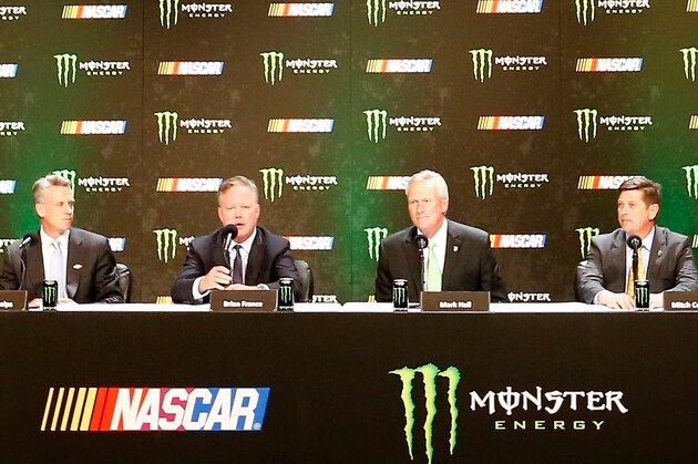 LAS VEGAS, NV - DECEMBER 01:  (2nd L) Brian France, NASCAR Chairman and CEO, speaks during a press conference as NASCAR and Monster Energy announce premier series entitlement partnership at Wynn Las Vegas on December 1, 2016 in Las Vegas, Nevada. Monster Energy, which will begin its tenure as naming rights partner on Jan. 1, 2017, will become only the third company to serve as the entitlement sponsor in NASCAR premier series history, following RJ Reynolds and Sprint/Nextel.   (Photo by Jonathan Ferrey/Getty Images)