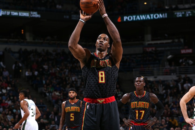Milwaukee, WI - DECEMBER 9: Dwight Howard #8 of the Atlanta Hawks shoots a free throw during the game against the Milwaukee Bucks on December 9, 2016 at the BMO Harris Bradley Center in Milwaukee, Wisconsin. NOTE TO USER: User expressly acknowledges and agrees that, by downloading and or using this Photograph, user is consenting to the terms and conditions of the Getty Images License Agreement. Mandatory Copyright Notice: Copyright 2016 NBAE (Photo by Gary Dineen/NBAE via Getty Images)
