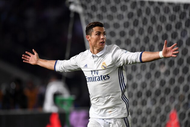 YOKOHAMA, JAPAN - DECEMBER 18:  Cristiano Ronaldo of Real Madrid celebrates scoring his team's third goal during  the FIFA Club World Cup final match between Real Madrid and Kashima Antlers at International Stadium Yokohama on December 18, 2016 in Yokohama, Japan.  (Photo by Etsuo Hara/Getty Images)