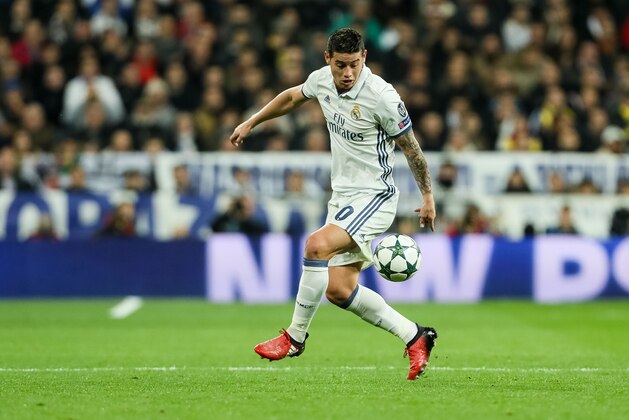 MADRID, SPAIN - DECEMBER 07: James Rodriguez of Real Madrid in action  during the UEFA Champions League match between Real Madrid CF and Borussia Dortmund at Bernabeu on December 7, 2016 in Madrid. (Photo by TF-Images/Getty Images)