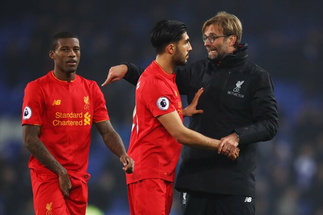 LIVERPOOL, ENGLAND - DECEMBER 19:  Emre Can of Liverpool and Jurgen Klopp manager of Liverpool in discussion as they celebrate victory after the Premier League match between Everton and Liverpool at Goodison Park on December 19, 2016 in Liverpool, England.  (Photo by Clive Brunskill/Getty Images)