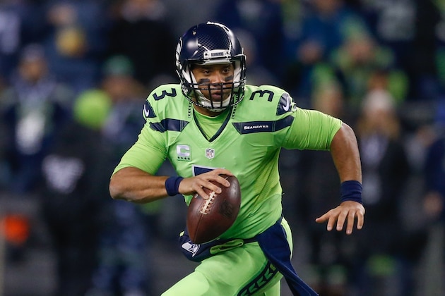 SEATTLE, WA - DECEMBER 15:  Quarterback Russell Wilson #3 of the Seattle Seahawks rushes against the Los Angeles Rams at CenturyLink Field on December 15, 2016 in Seattle, Washington.  (Photo by Otto Greule Jr/Getty Images)