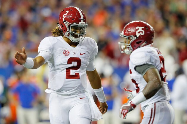 ATLANTA, GA - DECEMBER 03:  Jalen Hurts #2 celebrates with Joshua Jacobs #25 of the Alabama Crimson Tide after a second quarter touchdown against the Florida Gators during the SEC Championship game at the Georgia Dome on December 3, 2016 in Atlanta, Georgia.  (Photo by Kevin C. Cox/Getty Images)