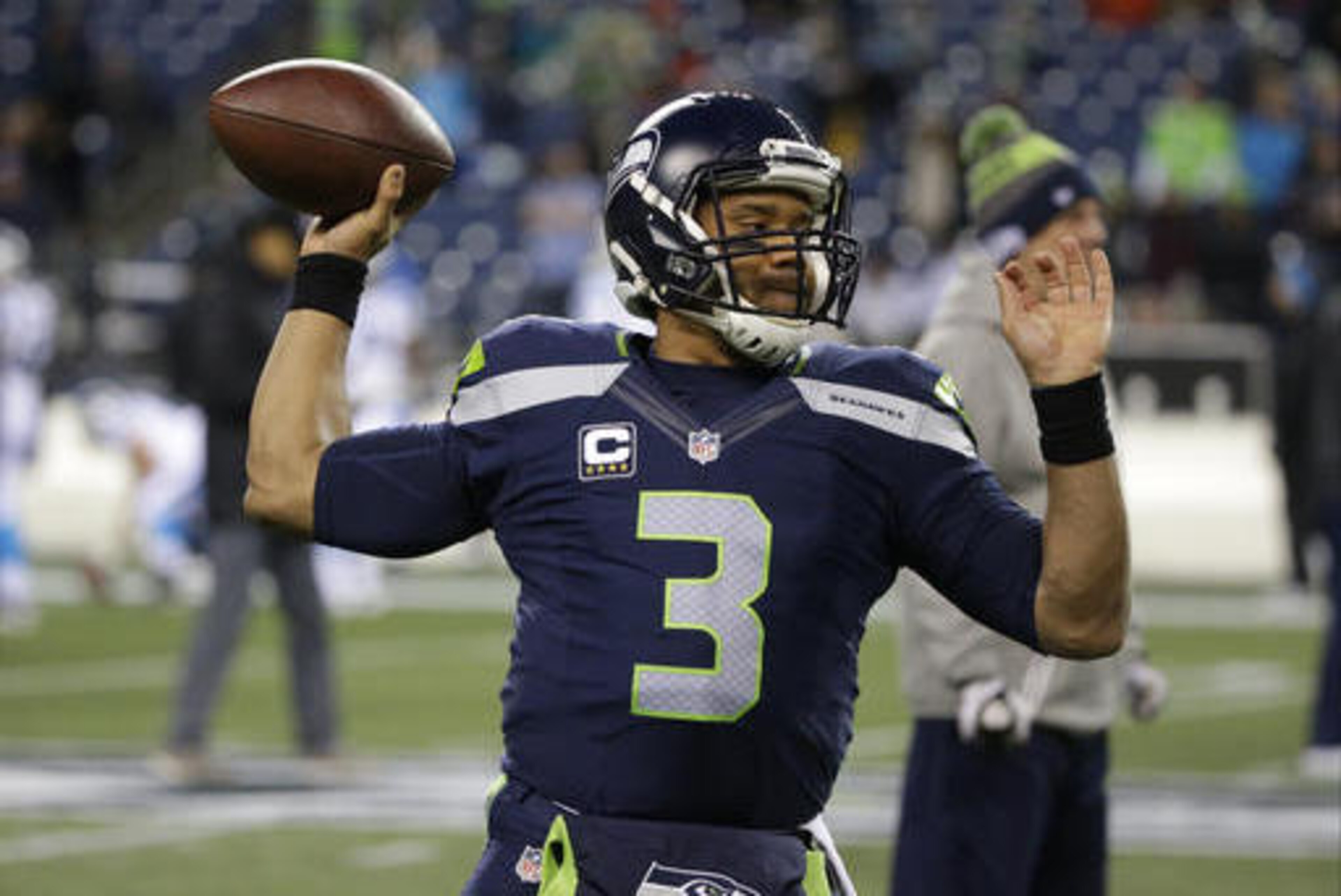 Seattle Seahawks quarterback Russell Wilson passes during warmups before an NFL football game against the Carolina Panthers, Sunday, Dec. 4, 2016, in Seattle. (AP Photo/Ted S. Warren) Seattle Seahawks quarterback Russell Wilson passes during warmups before an NFL football game against the Carolina Panthers, Sunday, Dec. 4, 2016, in Seattle. (AP Photo/Ted S. Warren)