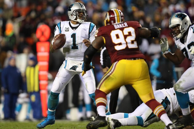 LANDOVER, MD - DECEMBER 19: Quarterback Cam Newton #1 of the Carolina Panthers passes the ball while teammate guard Chris Scott #79 defensive end Chris Baker #92 of the Washington Redskins in the fourth quarter at FedExField on December 19, 2016 in Landover, Maryland. (Photo by Patrick Smith/Getty Images)
