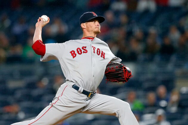 NEW YORK, NY - SEPTEMBER 28:  Clay Buchholz #11 of the Boston Red Sox pitches in the first inning against the New York Yankees at Yankee Stadium on September 28, 2016 in the Bronx borough of New York City.  (Photo by Jim McIsaac/Getty Images)