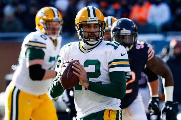CHICAGO, IL - DECEMBER 18:  Quarterback Aaron Rodgers #12 of the Green Bay Packers looks to pass in the second quarter against the Chicago Bears at Soldier Field on December 18, 2016 in Chicago, Illinois.  (Photo by Joe Robbins/Getty Images)