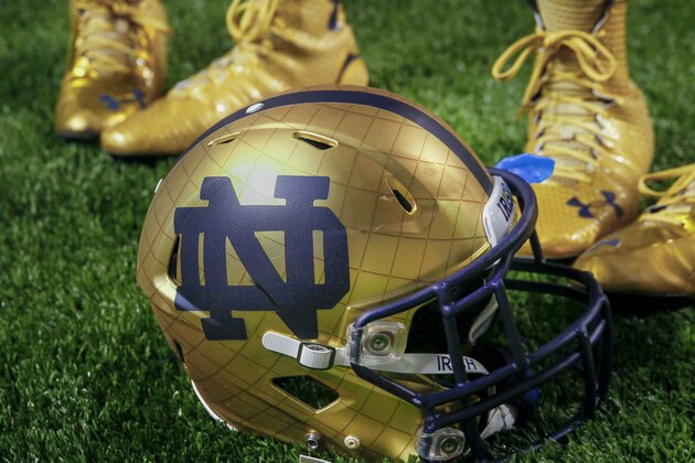 INDIANAPOLIS, IN - SEPTEMBER 13: General view of a Notre Dame Fighting Irish helmet on the field during the game against the Purdue Boilermakers at Lucas Oil Stadium on September 13, 2014 in Indianapolis, Indiana.  (Photo by Michael Hickey/Getty Images)