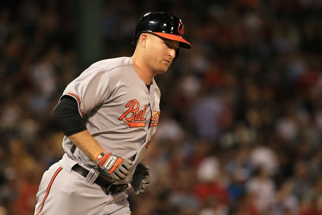 BOSTON, MA - SEPTEMBER 14:  Mark Trumbo #45 of the Baltimore Orioles rounds the bases after hitting a solo home run in the second inning of a game against the Boston Red Sox at Fenway Park on September 14, 2016 in Boston, Massachusetts.  (Photo by Adam Glanzman/Getty Images)