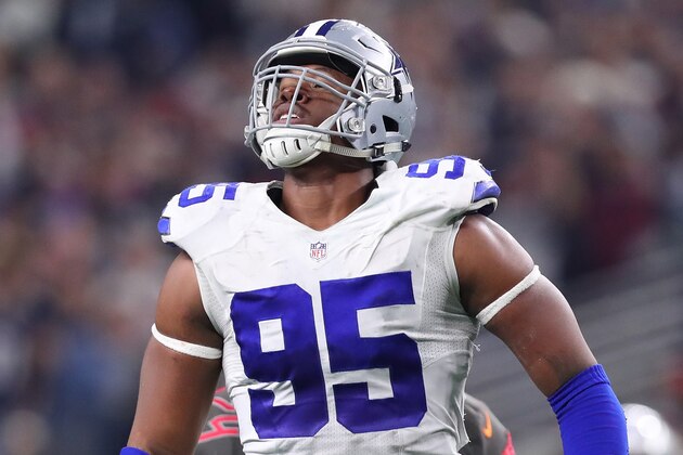ARLINGTON, TX - DECEMBER 18:  David Irving #95 of the Dallas Cowboys celebrates after sacking Jameis Winston #3 of the Tampa Bay Buccaneers during the fourth quarter at AT&T Stadium on December 18, 2016 in Arlington, Texas. (Photo by Tom Pennington/Getty Images)