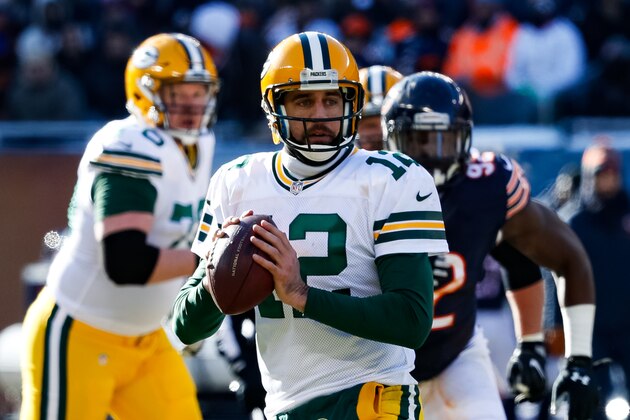 CHICAGO, IL - DECEMBER 18:  Quarterback Aaron Rodgers #12 of the Green Bay Packers looks to pass in the second quarter against the Chicago Bears at Soldier Field on December 18, 2016 in Chicago, Illinois.  (Photo by Joe Robbins/Getty Images)