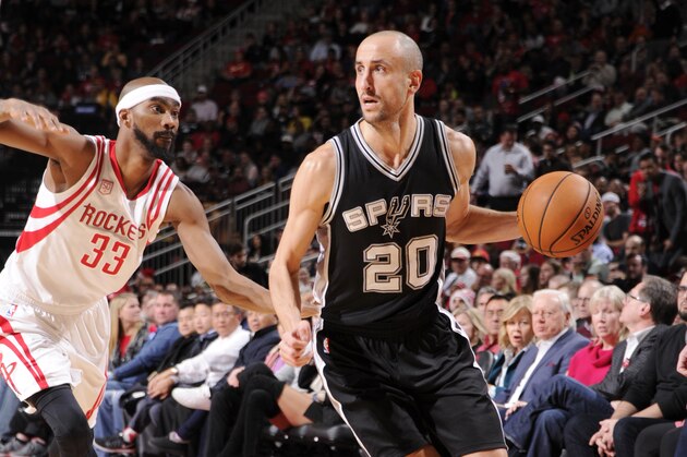 HOUSTON, TX - DECEMBER 20:   Manu Ginobili #20 of the San Antonio Spurs drives to the basket against Corey Brewer #33 of the Houston Rockets during the game on December 20, 2016 at the Toyota Center in Houston, Texas. NOTE TO USER: User expressly acknowledges and agrees that, by downloading and or using this photograph, User is consenting to the terms and conditions of the Getty Images License Agreement. Mandatory Copyright Notice: Copyright 2016 NBAE (Photo by Bill Baptist/NBAE via Getty Images)