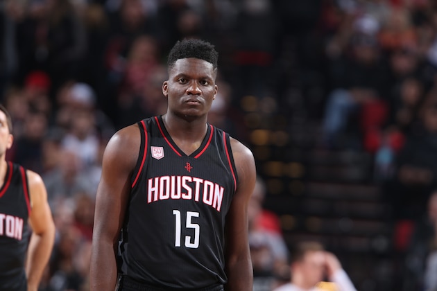 PORTLAND, OR - NOVEMBER 27: Clint Capela #15 of the Houston Rockets looks on during the game against the Portland Trail Blazers on November 27, 2016 at the Moda Center in Portland, Oregon. NOTE TO USER: User expressly acknowledges and agrees that, by downloading and or using this Photograph, user is consenting to the terms and conditions of the Getty Images License Agreement. Mandatory Copyright Notice: Copyright 2016 NBAE (Photo by Sam Forencich/NBAE via Getty Images)