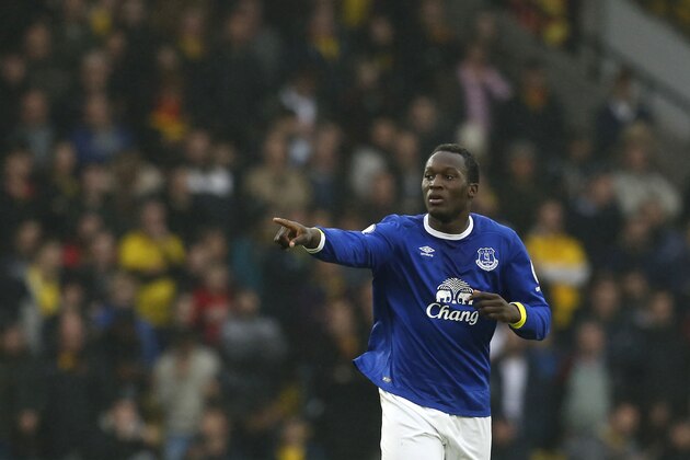 Everton's Belgian striker Romelu Lukaku celebrates after scoring during the English Premier League football match between Watford and Everton at Vicarage Road Stadium in Watford, north of London on December 10, 2016. / AFP / Ian KINGTON / RESTRICTED TO EDITORIAL USE. No use with unauthorized audio, video, data, fixture lists, club/league logos or 'live' services. Online in-match use limited to 75 images, no video emulation. No use in betting, games or single club/league/player publications.  /         (Photo credit should read IAN KINGTON/AFP/Getty Images)